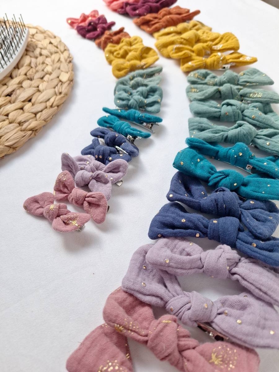 Mollette a fiocco per capelli diversi colori